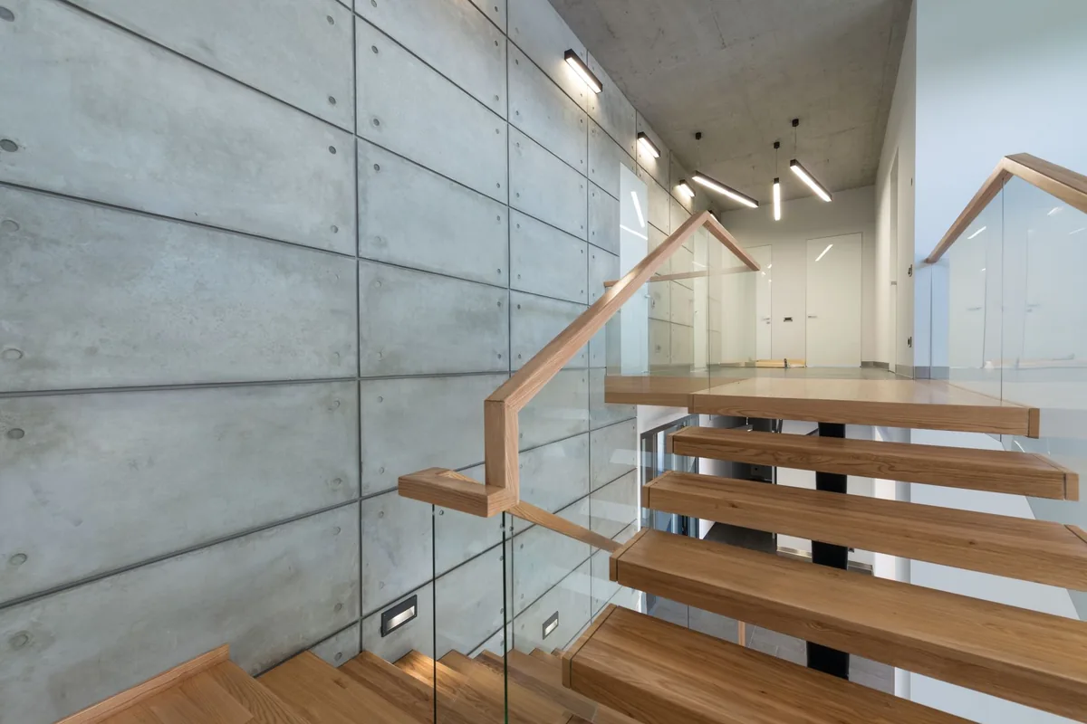 Oak staircase with open treads and a glass balustrade