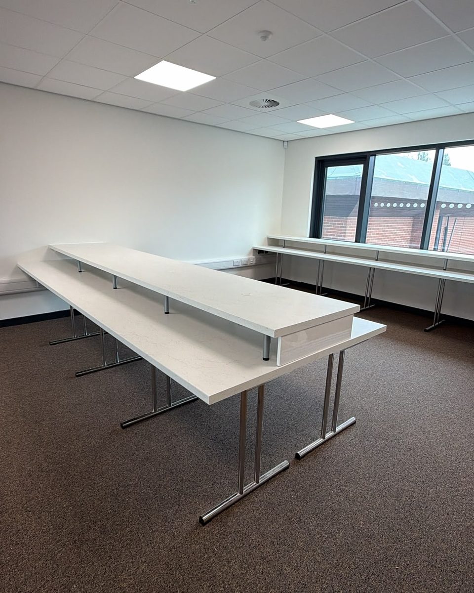 Freestanding twin-tier island bench on a chrome leg frame