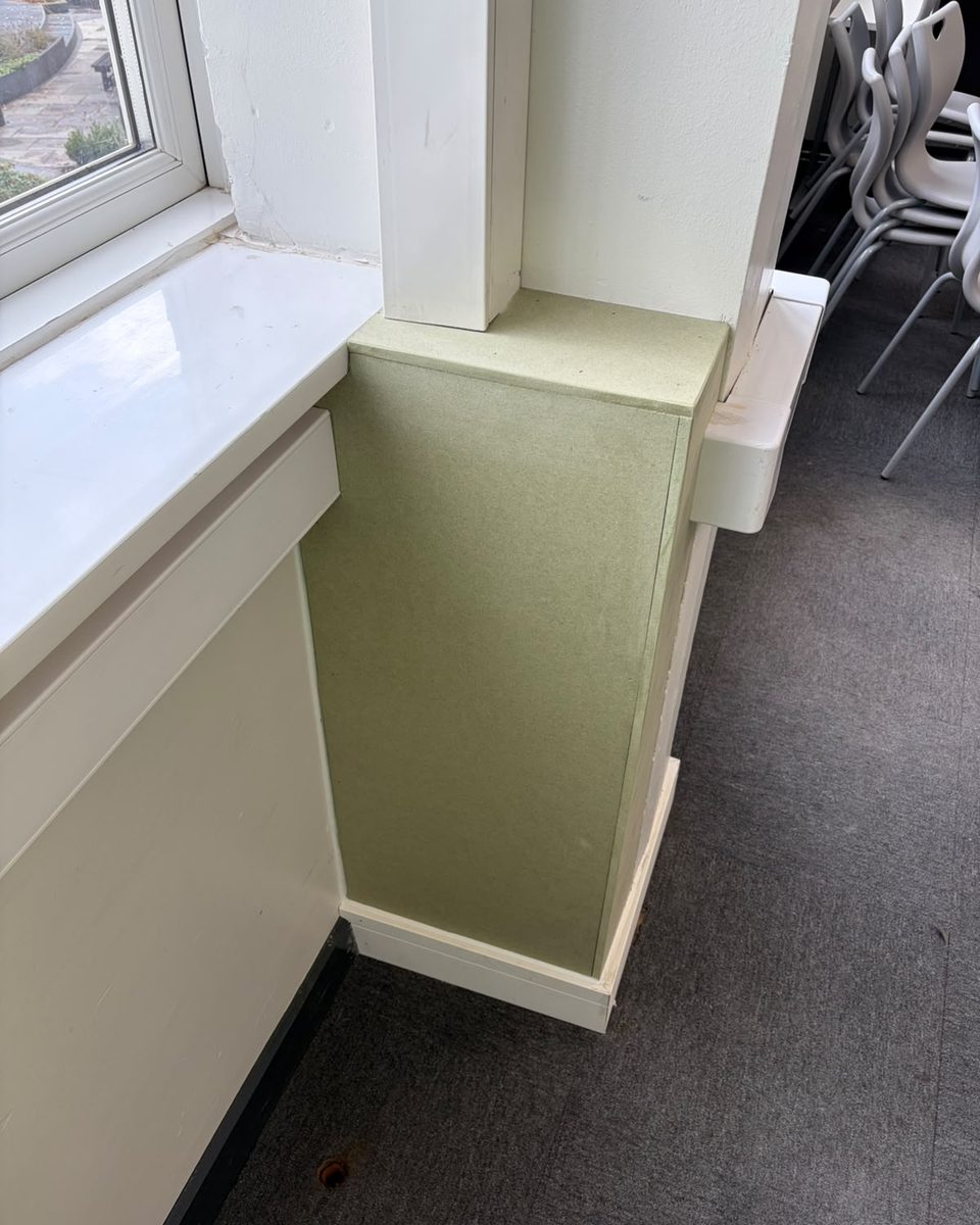 Close detail of MDF column boxing meeting the skirting line