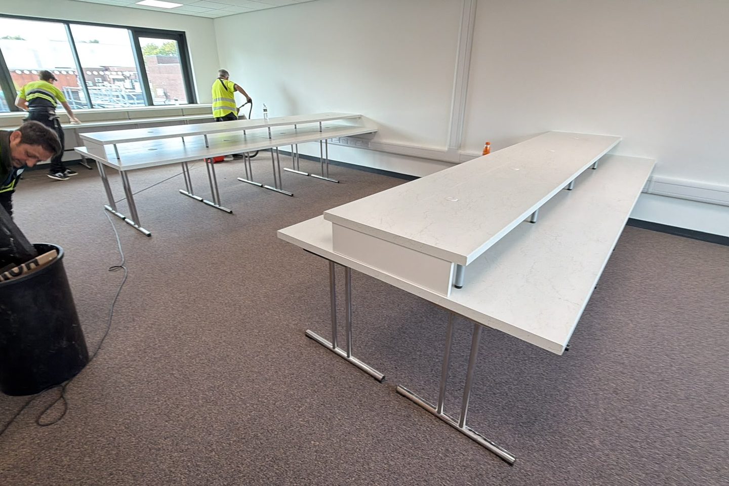 The team in hi-vis clearing down after a bench installation